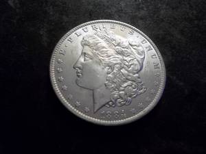 lot 6 image: 1884 O Morgan Silver Dollar