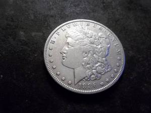 lot 9 image: 1886 O Morgan Silver Dollar