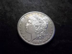 lot 11 image: 1887 S Morgan Silver Dollar