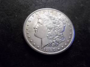 lot 16 image: 1897 S Morgan Silver Dollar