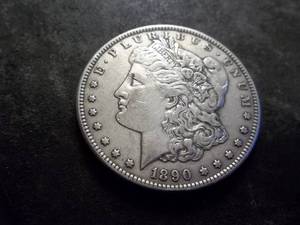 lot 20 image: 1890 CC Morgan Silver Dollar