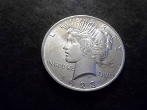 lot 42 image: 1923 Peace Silver Dollar