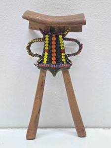 lot 33 image: Vintage African Beaded Wood &amp Leather Headrest