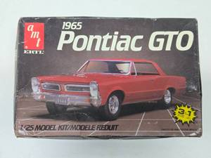 lot 300 image: NOS Unbuilt AMT 1965 Pontiac GTO Model Kit 125