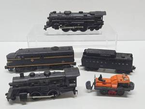 lot 311 image: Group of Old Vintage 1950s era LIONEL Trains Including engines