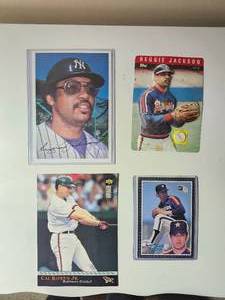 lot 90 image: 4 over size Baseball Cards- Reggie Jackson, Nolan Ryan, Cal Ripken Jr.