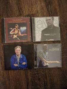 lot 117 image: 4 Eric Clapton music CDs.