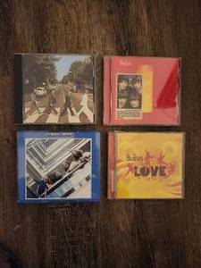 lot 118 image: 4 Beatles CDs.