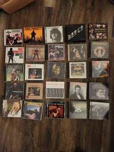 lot 133 image: Collection of 25 rock music CDs, which are considered collectibles.