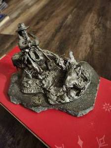 lot 136 image: Maverick Calf pewter sculpture by artist Donald Polland.