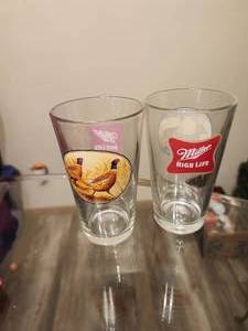 lot 143 image: 2 Vintage Miller High Life beer glasses.