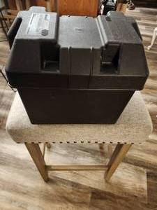 lot 144 image: Attwood standard marine battery box, likely for Group 24 or 27 series batteries.