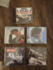 lot 123 image: 5 Bob Dylan music CDs.