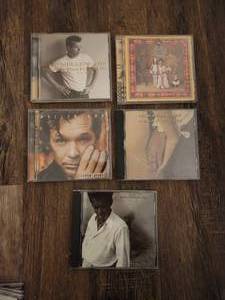 lot 128 image: 5 John Mellencamp CDs.