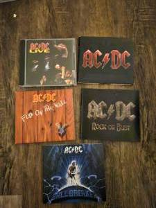 lot 132 image: 5  ACDC music CD albums.