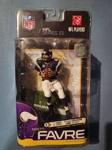 lot 146 image: McFarlane Toys NFL Series 23 Brett Favre action figure in a Minnesota Vikings purple jersey.