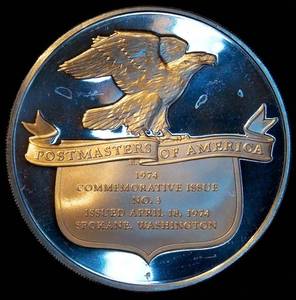 lot 46 image: 1974 Proof Sterling Silver Postmasters of America Commemorative - Spokane, WA - .815oz