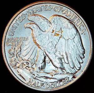 lot 52 image: High Grade Uncirculated 1943 P Walking Liberty Half Dollar - Full Luster, minor residue