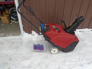 lot 105 image: Toro power clear 721 snow thrower. Used condition. Tested & works. As shown.