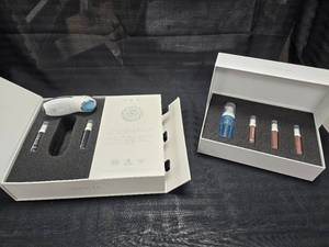 lot 39 image: Juvinesse Electro Stimulation Facial Rejuvenation Kit with Refill Kit