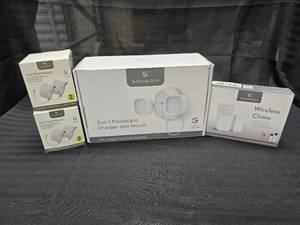 lot 69 image: Wasserman Flood light and Charger 2 -2 pk of anti theft mounts - wireless chime (Google Nest)