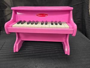 lot 185 image: Mellissa and Doug kids pink piano