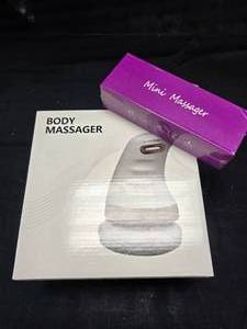 lot 209 image: Body Massager and  Mini Massager
