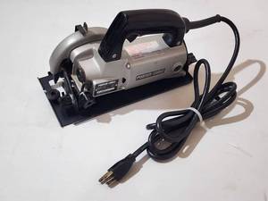 lot 27 image: Porter Cable Electric 4 12 Trim Saw