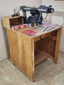 lot 21 image: Craftsman 10 Radial Arm Saw Mounted on a Rolling Base