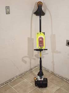lot 126 image: Ryobi Gas Weed Trimmer with Additional Line