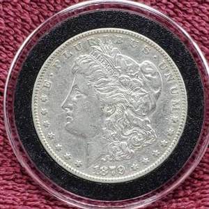 lot 15 image: 1879 Morgan Silver Dollar in Airtite, Higher Grade