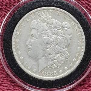 lot 20 image: 1882-O Moregan Silver Dollar in Airtite