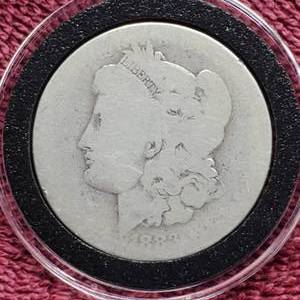 lot 22 image: 1883-O Morgan Silver Dollar in Airtite, Highly Experienced Coin