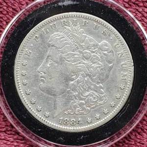 lot 24 image: 1884-S Morgan Silver Dollar in Airtite, Higher Grade