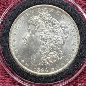 lot 26 image: 1884-O Morgan Silver Dollar in Airtite, High Grade