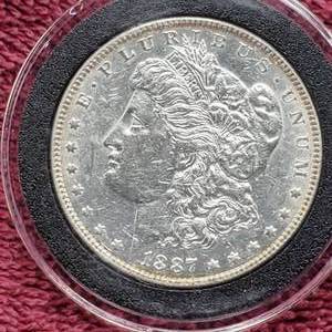lot 32 image: 1887 Morgan Silver Dollar in Airtite, High Grade
