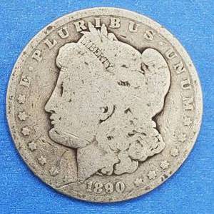 lot 77 image: 1890-O Morgan Silver Dollar
