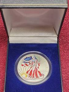 lot 83 image: 1999 American Silver Eagle, Colored in Display Box
