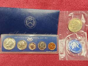 lot 151 image: 1974-S Ike Dollar, Blue Label 40% Silver & 1966 Mint Set with 40% Silver Half Dollar
