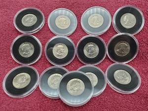 lot 152 image: 13 Susan B. Anthony Dollars in Airtites, All BU