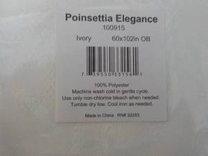 lot 96 image: Poinsettia Elegance 60 x 102 Oblon...