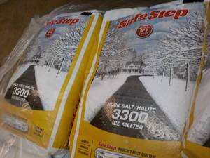 lot 138 image: 2 bags Safe Step 50 lbs. each Rock ...