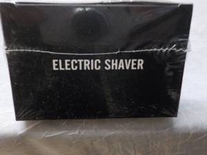 lot 246 image: Electric Razor...