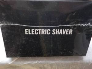 lot 245 image: Electric Shaver...