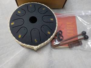 lot 255 image: Steel Tonque Drum...