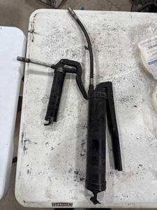 lot 0938 image: Two Manual Grease Guns