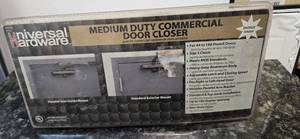 lot 12 image: Universal Hardware Medium Duty Commercial Door Closer (NEW)
