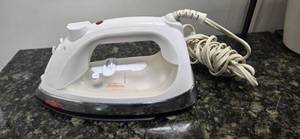 lot 34 image: Sunbeam Pressing Iron from a Shutdown Hotel