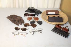 lot 24 image: Assorted Lot of Vintage Eyeglasses, Sunglasses, Leather Gloves, and Woven Basket