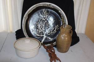 lot 29 image: Rustic Pottery Collection with Tree Plate, Covered Casserole, Pitcher, and Wooden Accent